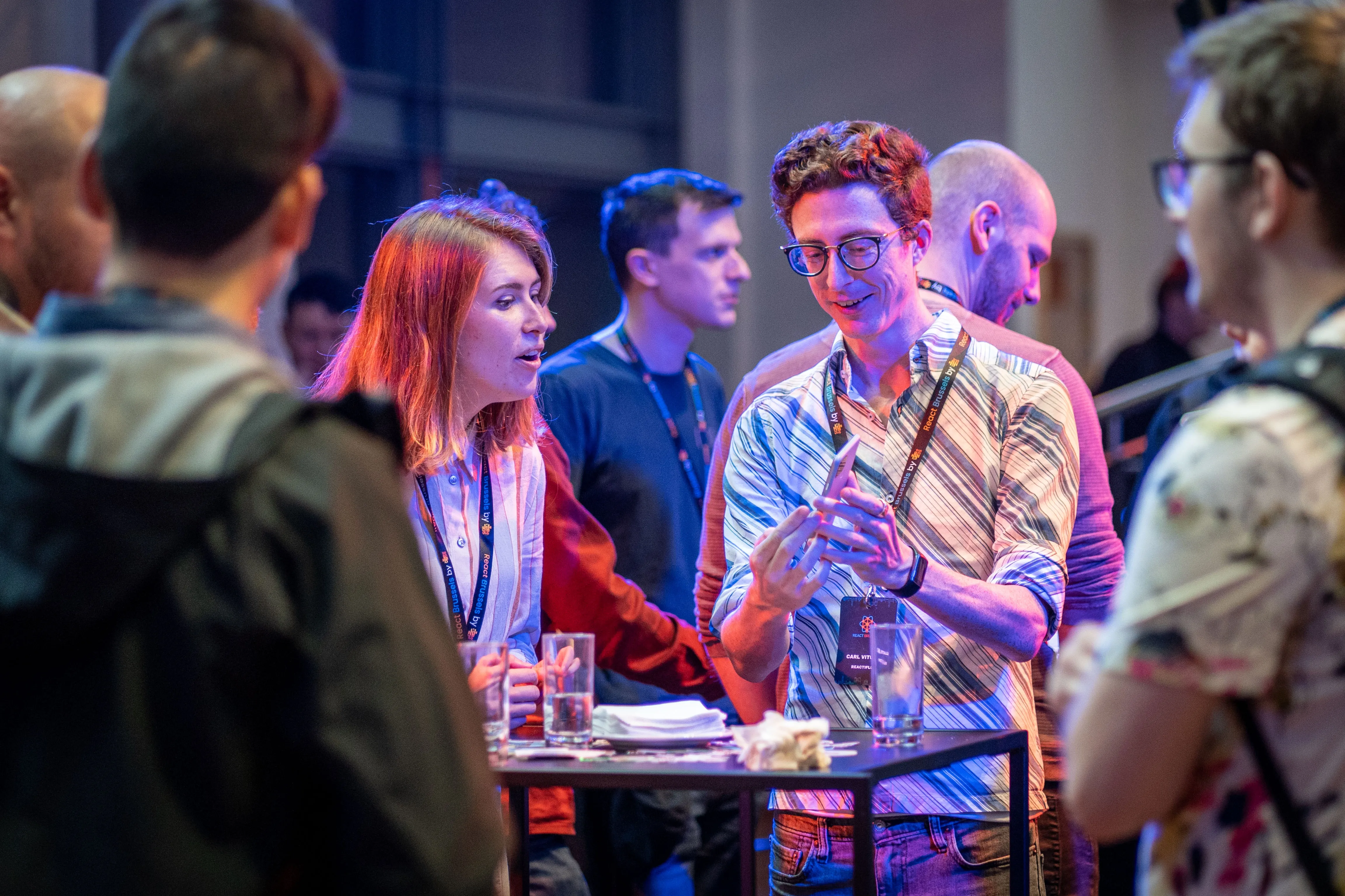 People discussing at a conference